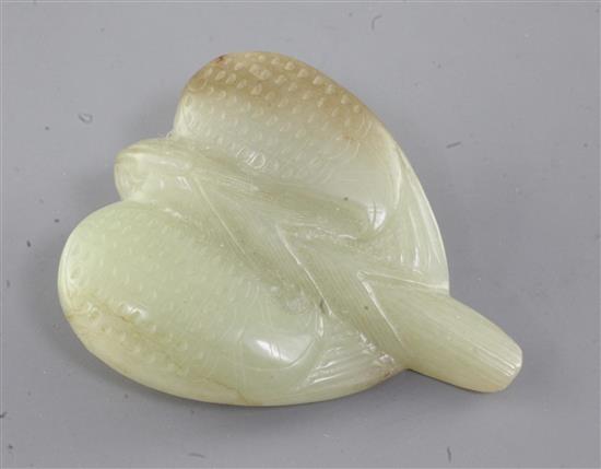A Chinese yellow and russet jade carving of a falcon, Eastern Zhou dynasty or later, 7.7cm